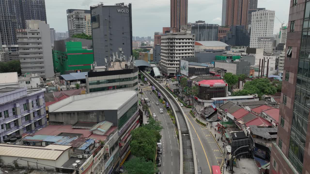 阴天吉隆坡市区交通街道地铁线路航拍全景4k马来西亚视频素材