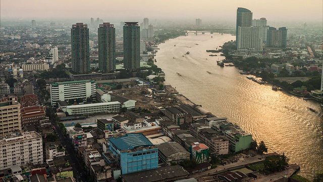 沿Chaopraya河的现代建筑，曼谷城市的延时高度视图视频素材