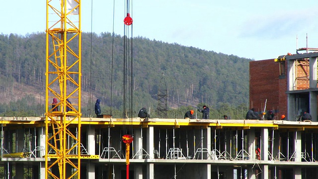 塔式起重机和建筑工地的快速时间流逝视频素材