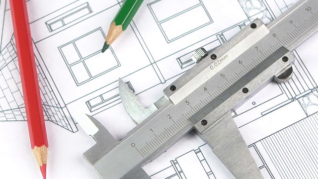 用卡尺和铅笔标出建筑平面图，平面图，旋转式，特写视频素材