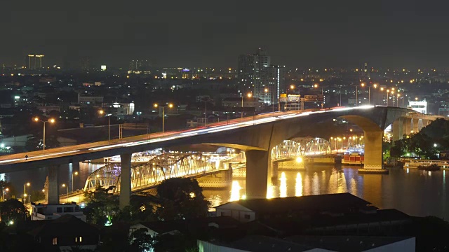 泰国夜光曼谷酒店屋顶交通道路河流桥梁4k时间流逝视频素材