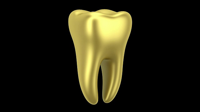 金色的人类牙齿环在黑色背景上旋转视频下载