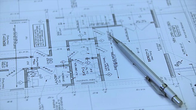 建筑蓝图和蓝图与绘图工具卷视频素材