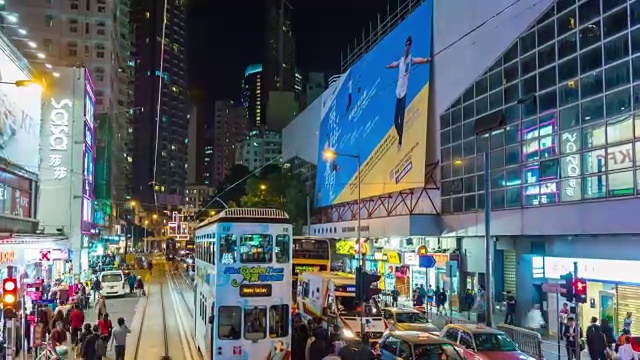 中国香港夜市中心有轨电车乘坐街景全景4k时间推移视频素材