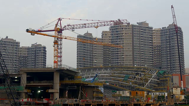 香港城市景观日落时分建筑起重机酒店全景4k中国视频素材