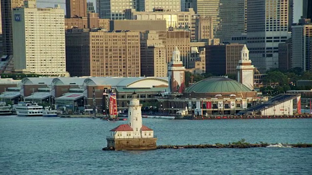 空中日出海军码头和城市摩天大楼视频素材