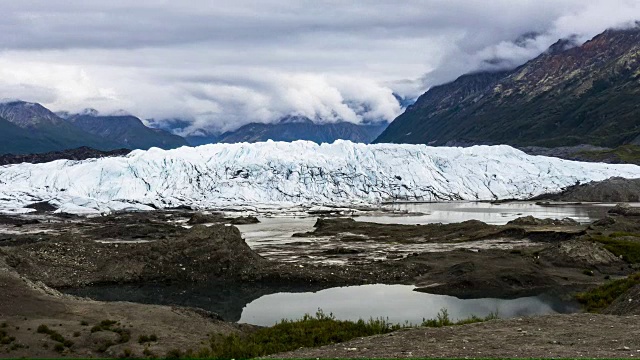 Matanuska Glacier Alaska Chugach Mountains with clouds and pond的时间流逝剪辑视频素材