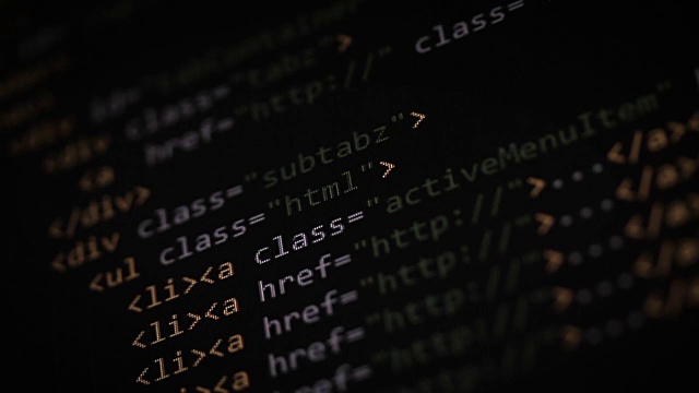 HTML, CSS, JavaScript和PHP彩色代码滚动在黑暗的背景视频素材