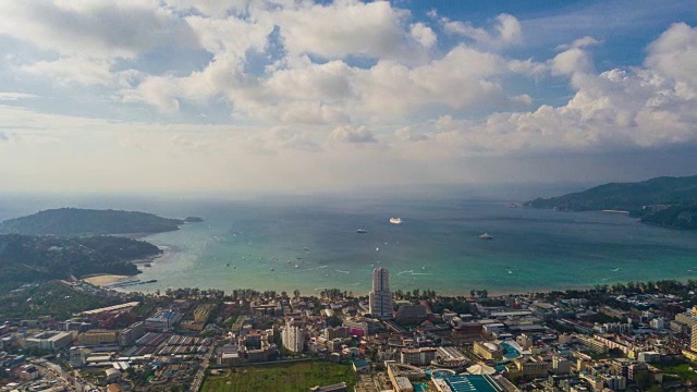 阳光明媚的一天普吉岛巴东海滩小镇空中全景图4k时间推移泰国视频素材