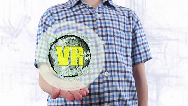 年轻人展示了地球的全息图和文本VR视频素材