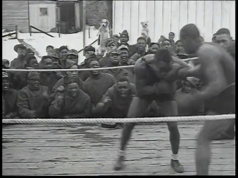 1934年，美国男子参加拳击比赛，观众为美国欢呼视频素材