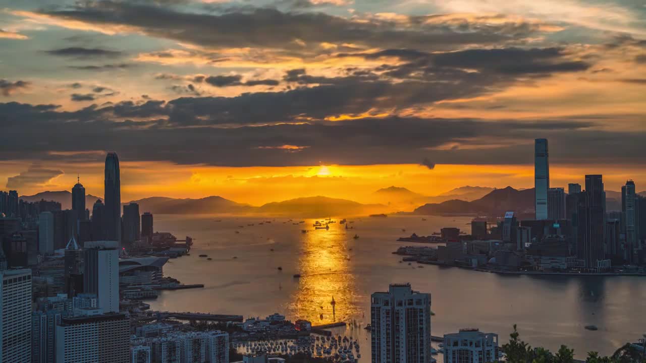 香港维多利亚港城市日落晚霞灯光夜景延时视频素材