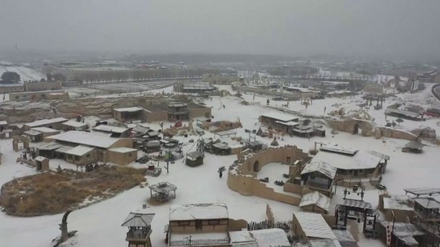 航拍下雪中的宁夏银川镇北堡影视城视频素材