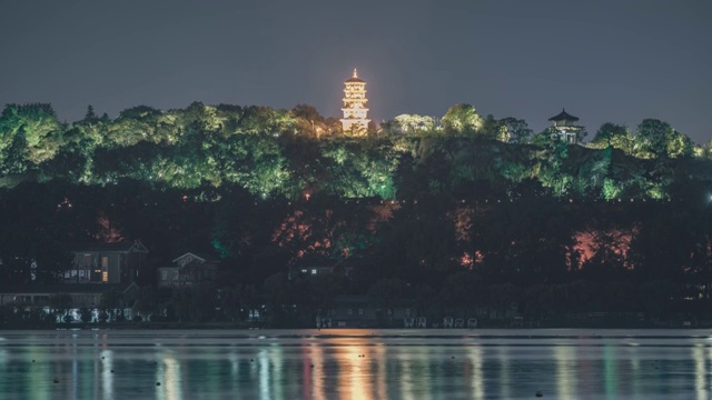 4K30P夜景湖面倒影佛塔山丘树林延时视频素材