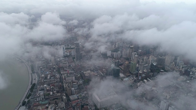 从飘动的云层上航拍中国上海浦西视频素材