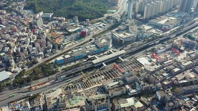 广东省深圳市龙岗区双龙地铁站和龙岗大道航拍视频素材