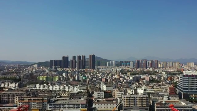 广东省深圳市龙岗区双龙地铁站和龙岗大道航拍视频素材