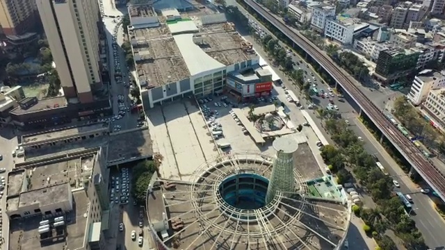 广东省深圳市龙岗区双龙地铁站和龙岗大道航拍视频素材