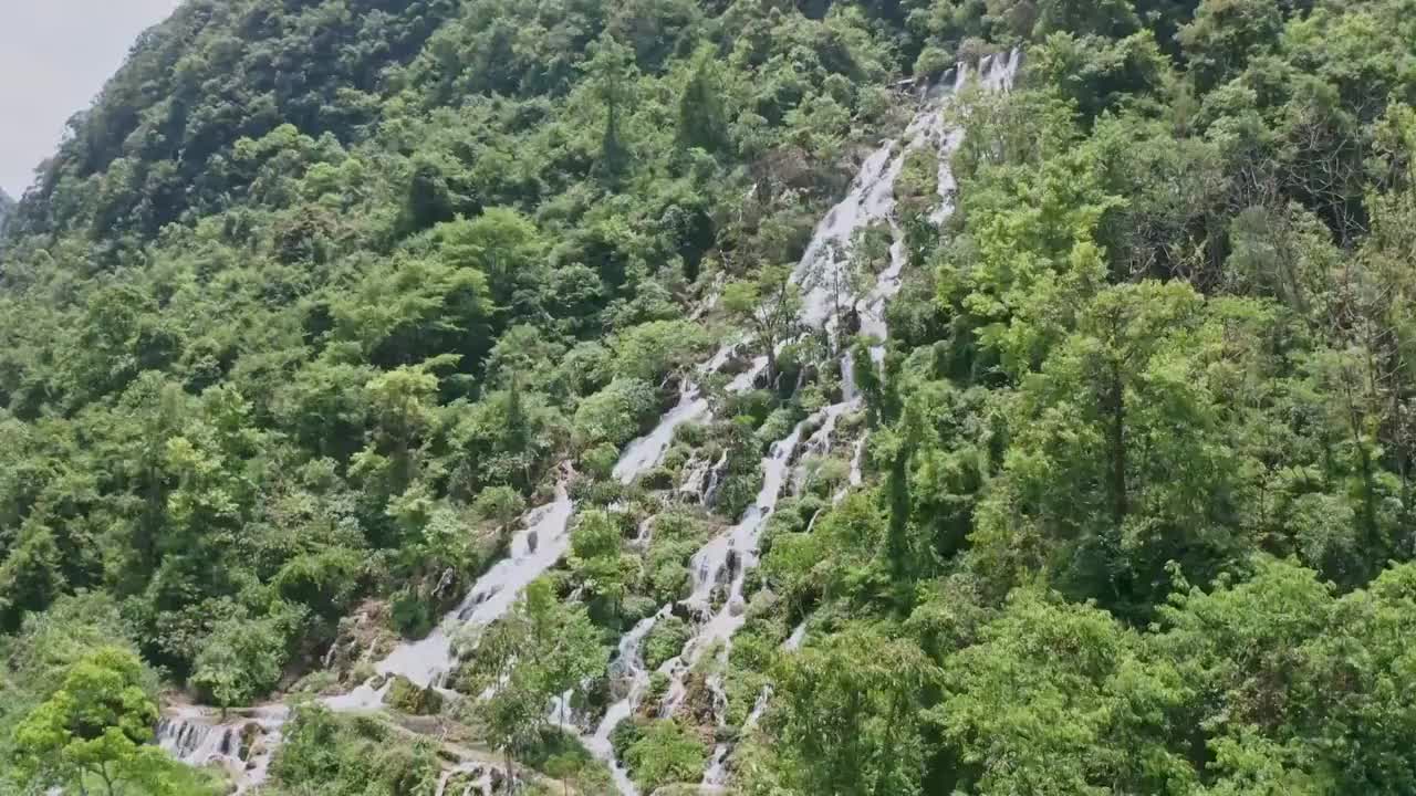 贵州黔南荔波樟江大小七孔景区卧龙潭瀑布 4K航拍视频视频素材