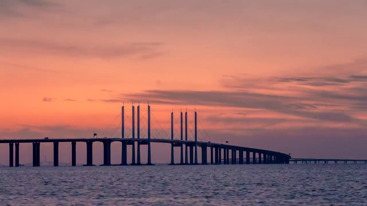 青岛胶州湾跨海大桥夕阳延时摄影视频素材