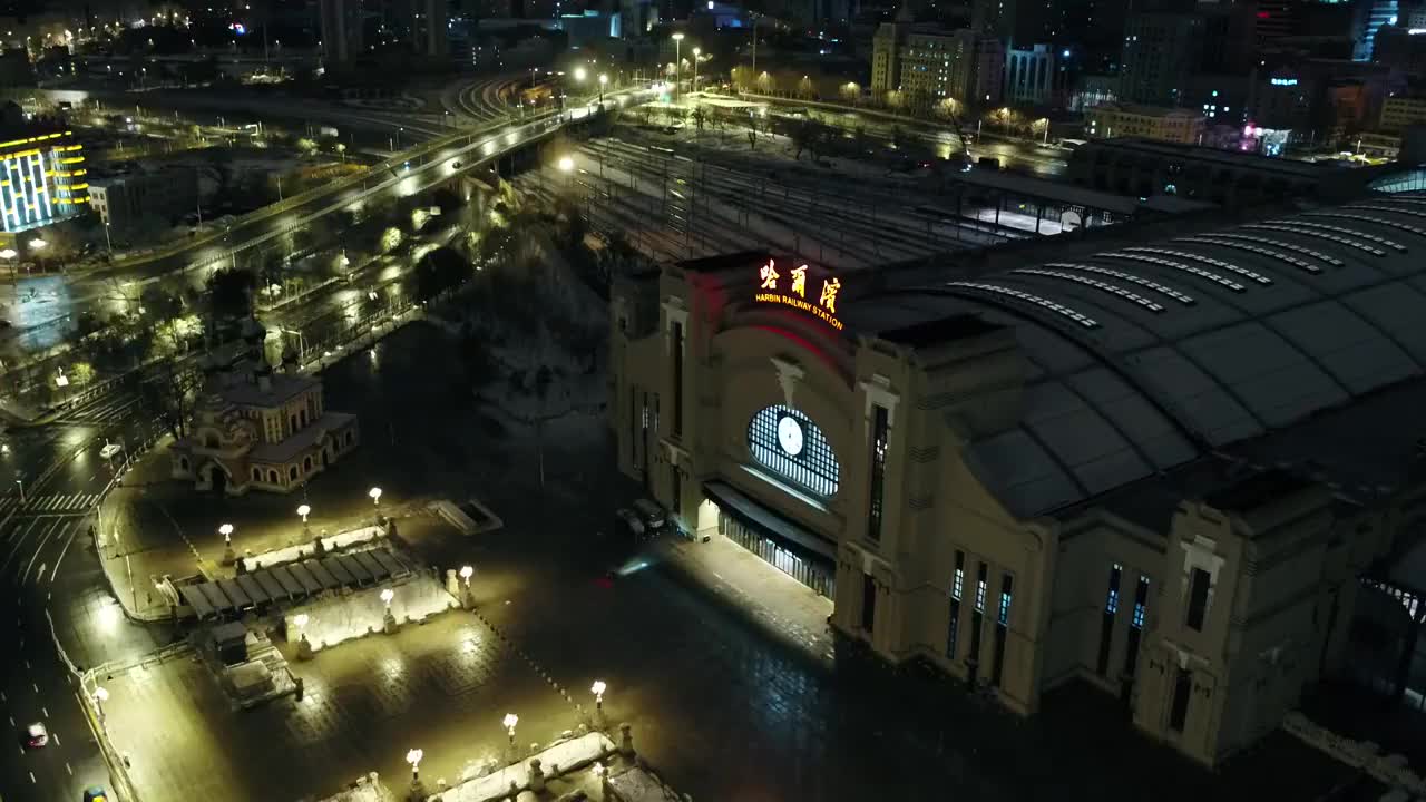 4K航拍哈尔滨火车站夜景视频素材