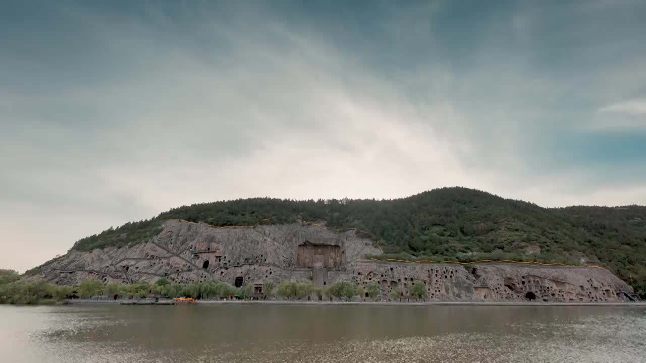 河南省洛阳市龙门石窟景区晚霞延时视频素材