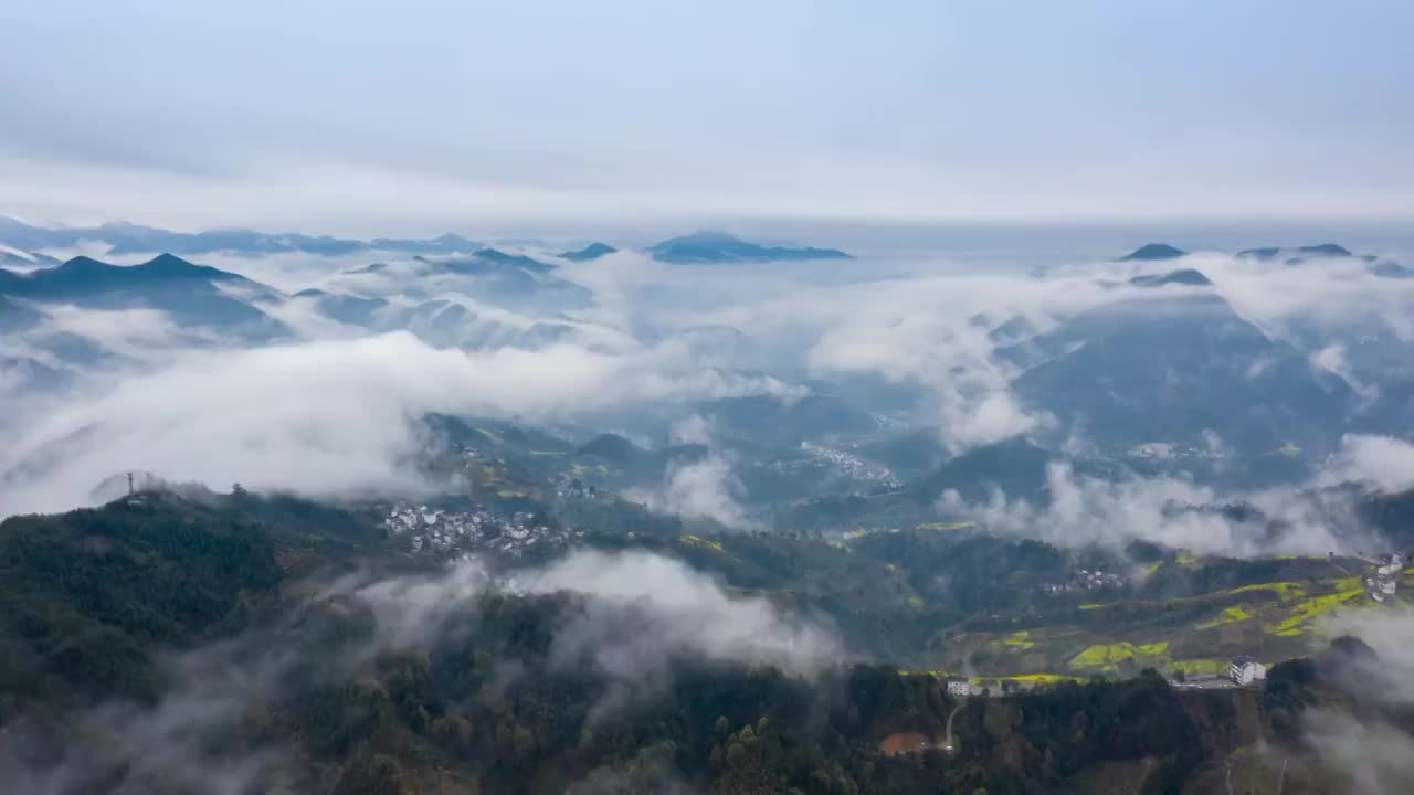 歙县坡山风景区春季油菜花云海风光4K延时航拍视频素材