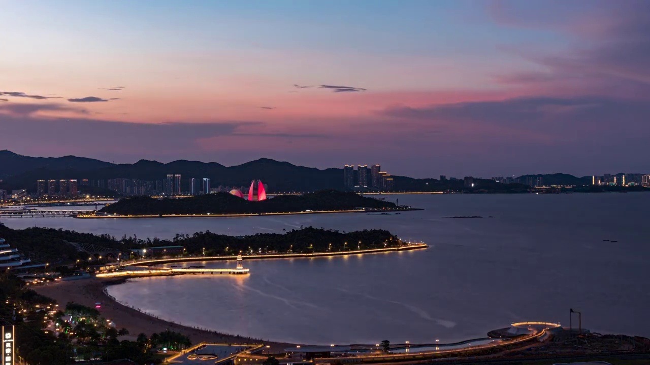 广东省珠海爱情邮局灯塔城市风光日转夜延时视频素材