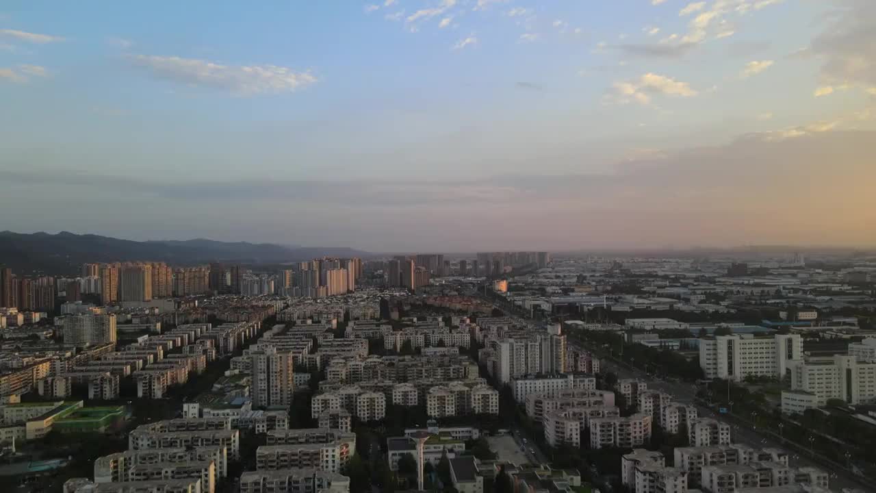 成都市龙泉驿区夜晚市区城市主干道航拍夜景建筑视频素材