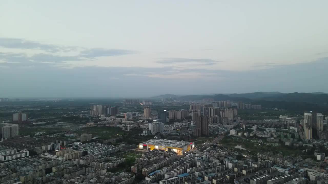 成都市龙泉驿区夜晚市区城市主干道航拍夜景建筑视频素材