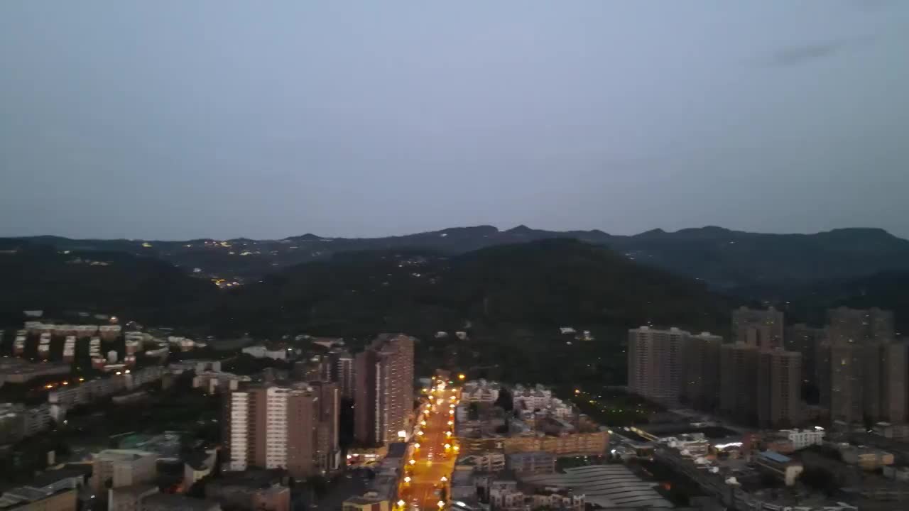 成都市龙泉驿区夜晚市区城市主干道航拍夜景建筑视频素材