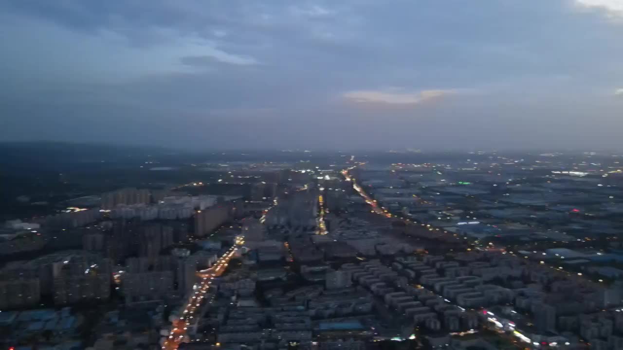 成都市龙泉驿区夜晚市区城市主干道航拍夜景建筑视频素材