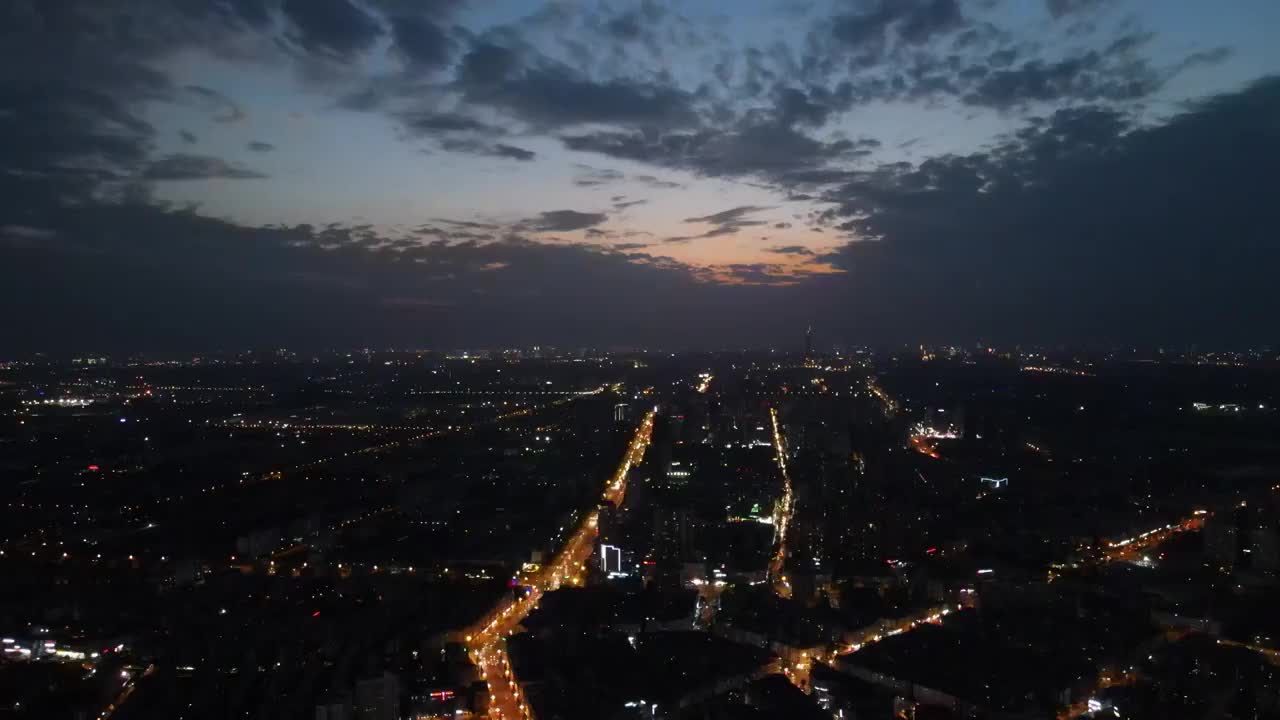 成都市龙泉驿区夜晚市区城市主干道航拍夜景建筑视频素材