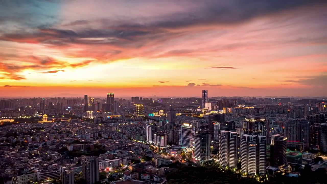 中山市东区金融街和市区城市天际线日落夜景航拍延时4K视频素材