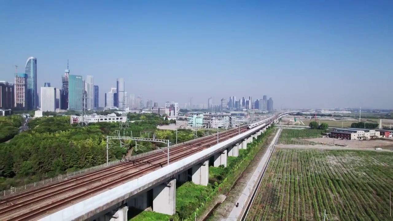 航拍高铁穿过现代城市杭州萧山视频素材