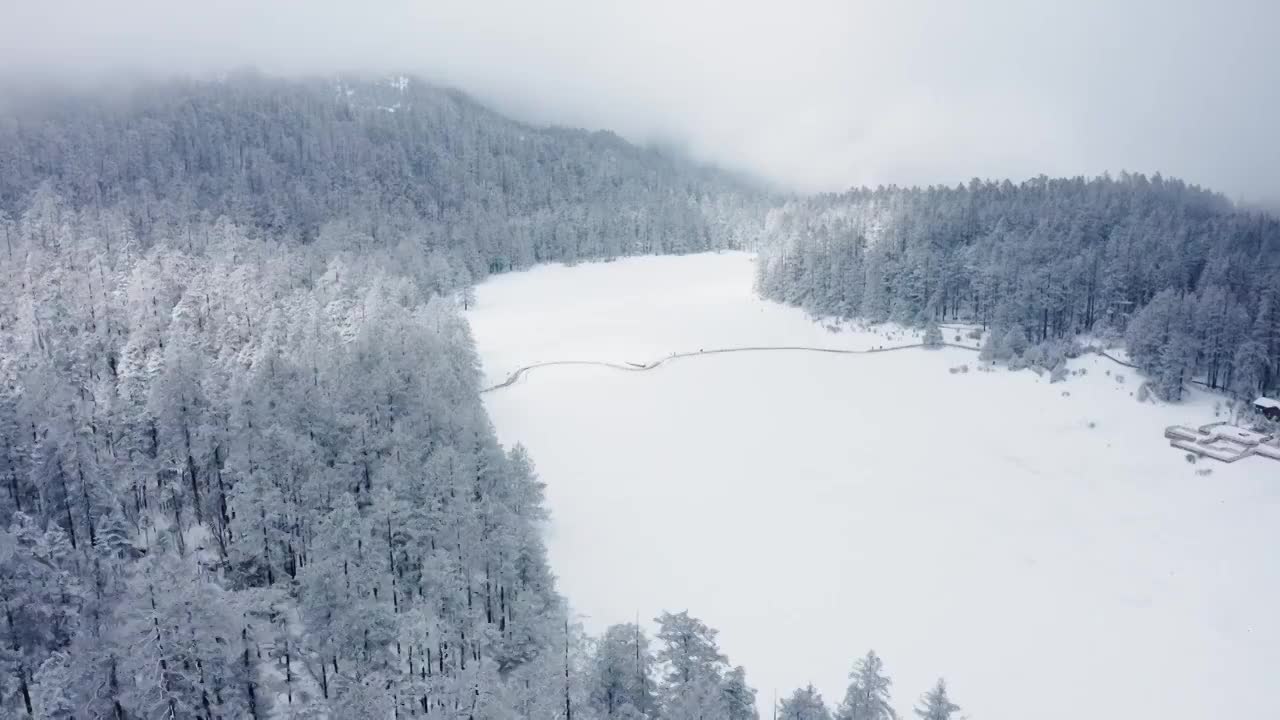 云南丽江玉龙雪山航拍雪景视频素材