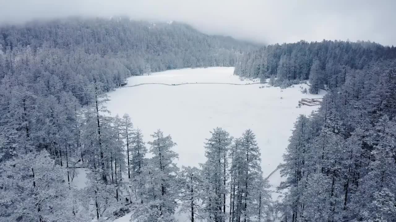 云南丽江玉龙雪山航拍雪景视频素材