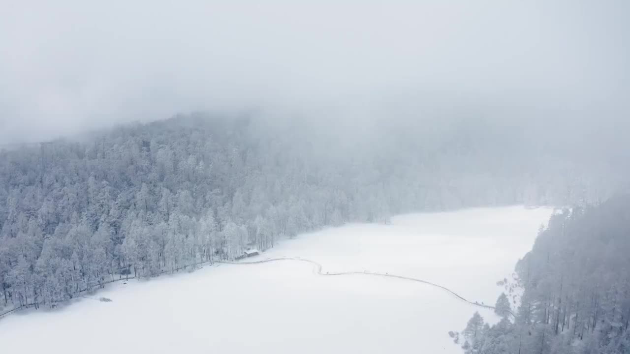 云南丽江玉龙雪山航拍雪景视频素材