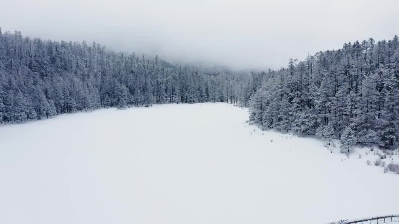 云南丽江玉龙雪山航拍雪景视频素材