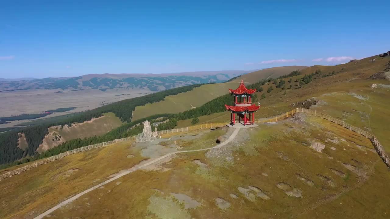 新疆哈密东天山风景区东天山庙宇草原高山草甸自然景观航拍视频素材