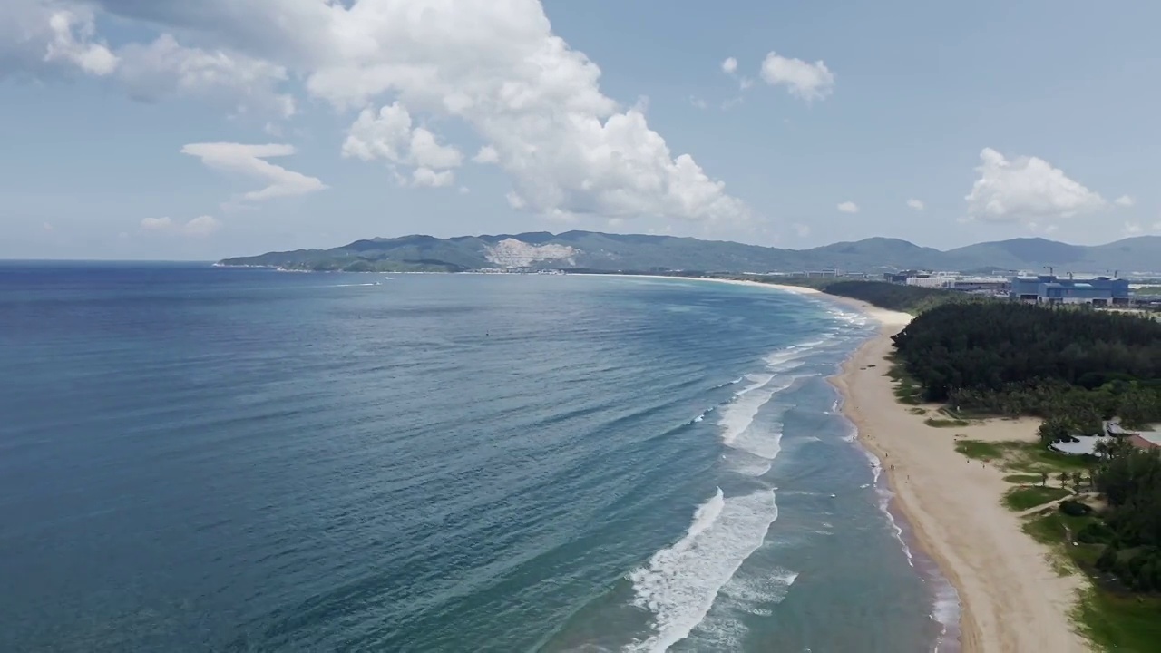 海南三亚海棠湾,航拍海岸线风景,蓝天白云视频素材