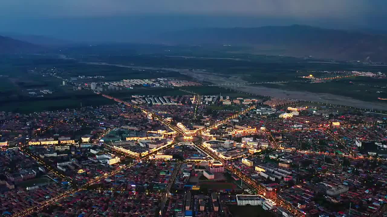 航拍中国新疆伊犁特克斯县八卦城夜景视频素材