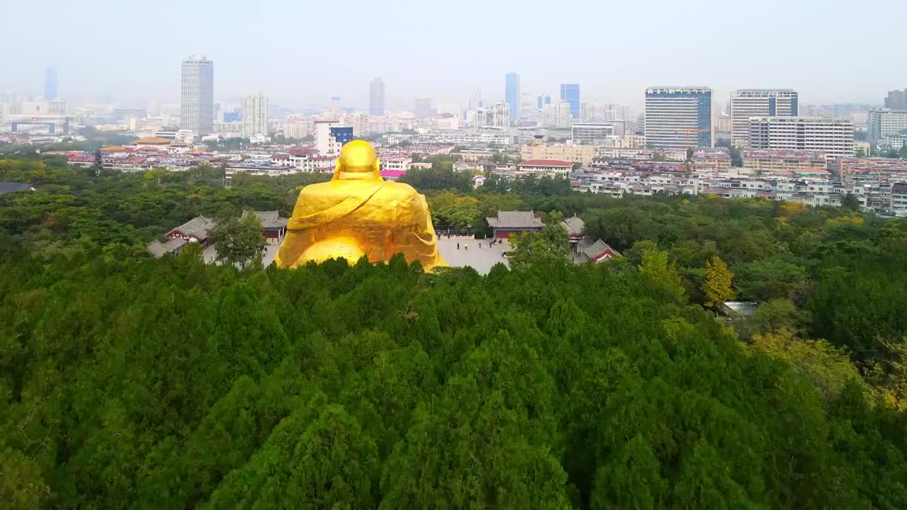 航拍山东济南著名景点千佛山风景区弥勒佛塑像视频素材