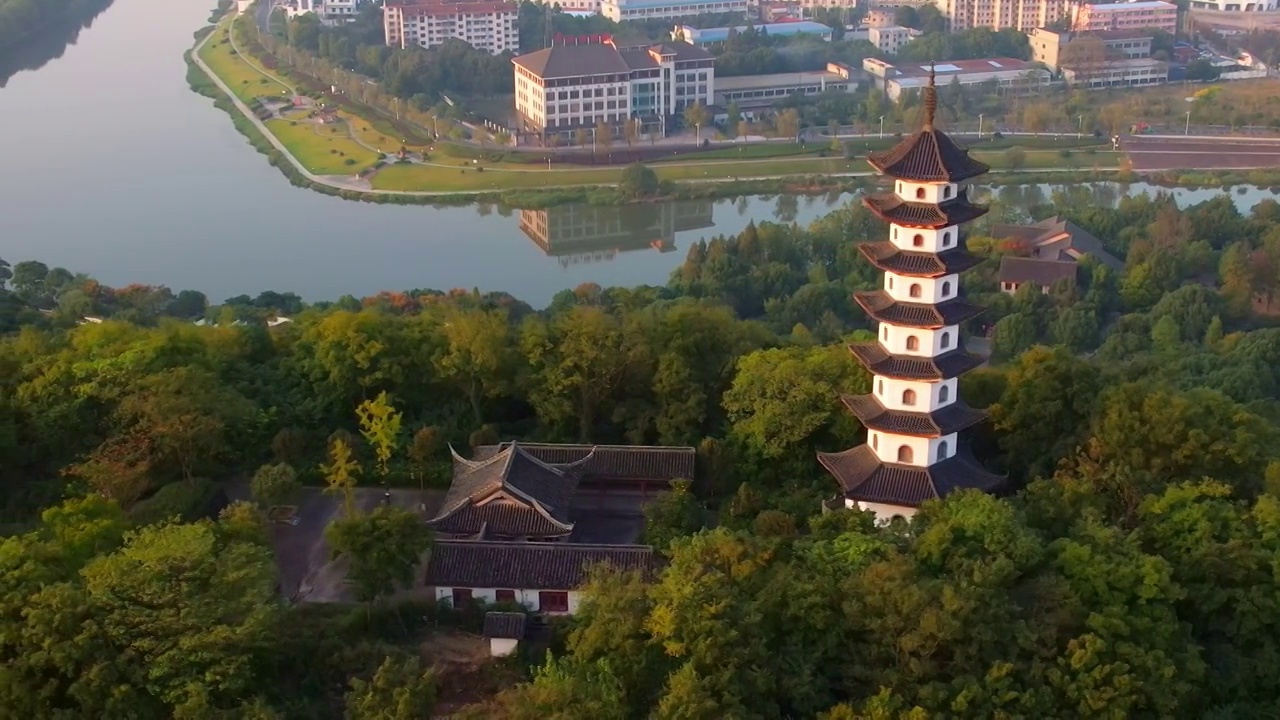 航拍夕阳下绍兴诸暨著名景点西施故里金鸡塔视频素材