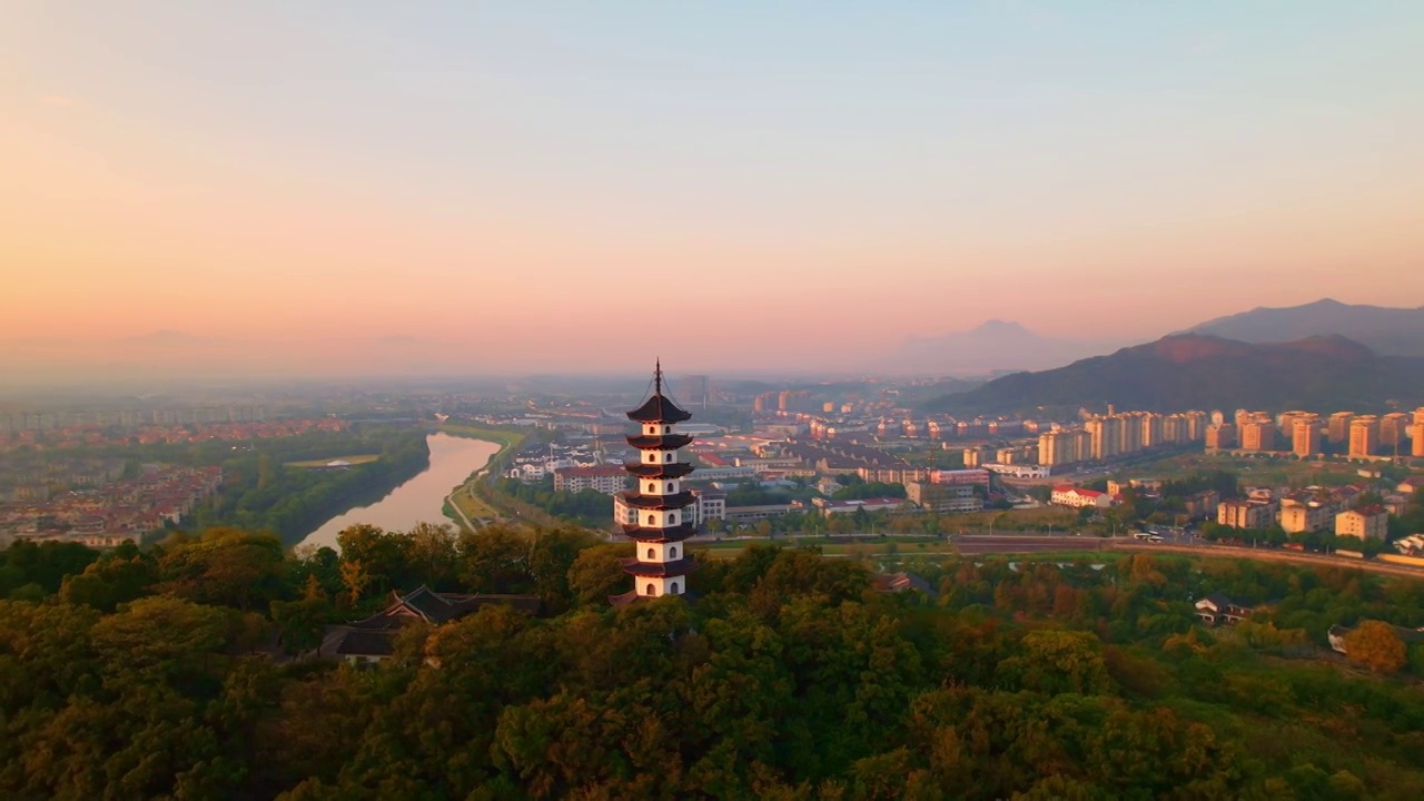 航拍夕阳下绍兴诸暨著名景点西施故里金鸡塔视频素材