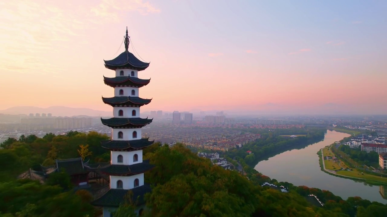 航拍夕阳下绍兴诸暨著名景点西施故里金鸡塔视频素材