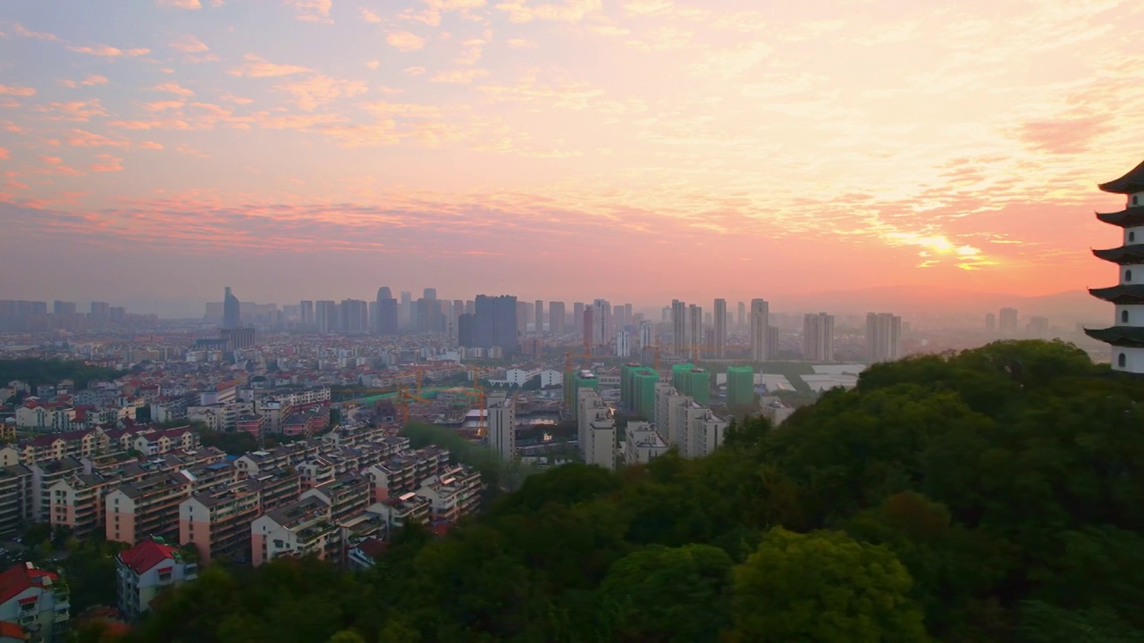 航拍夕阳下绍兴诸暨著名景点西施故里金鸡塔视频素材