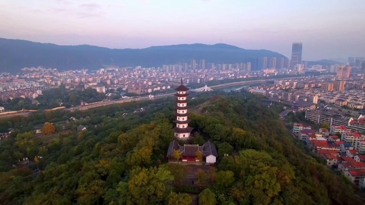 航拍夕阳下绍兴诸暨著名景点西施故里金鸡塔视频素材