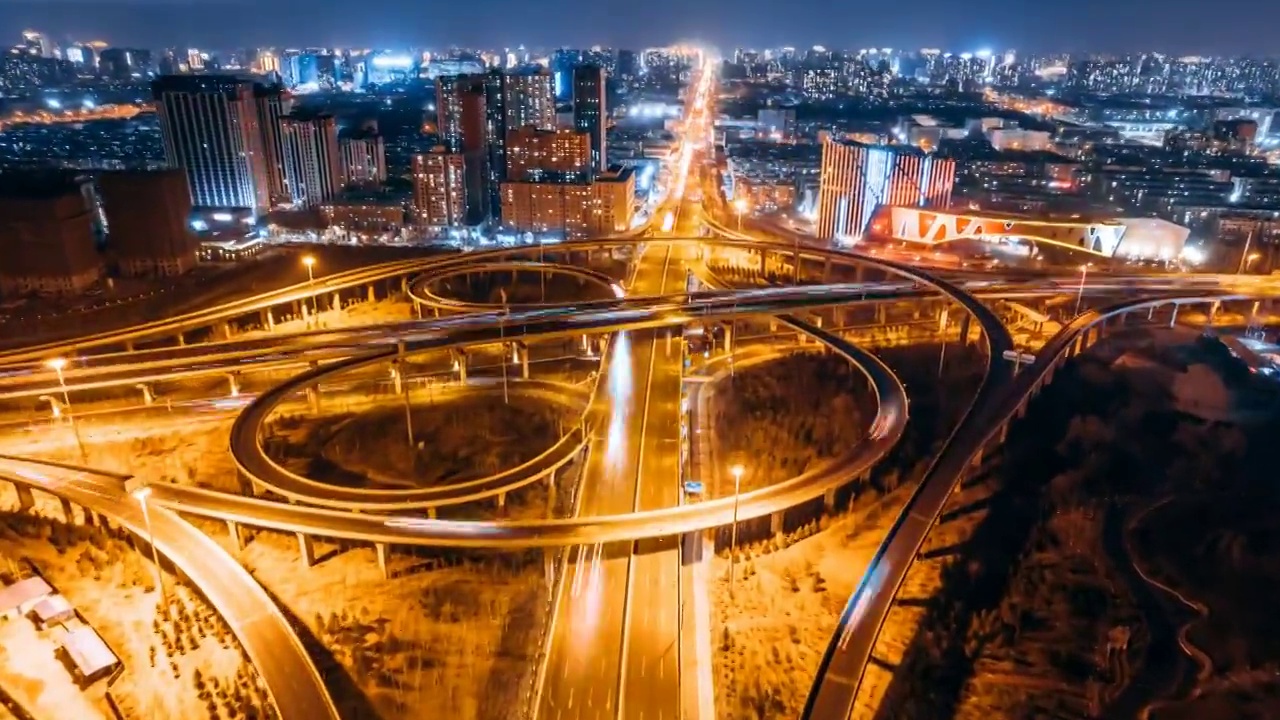 中国内蒙古呼和浩特兴安南路立交桥延时摄影夜景航拍视频素材