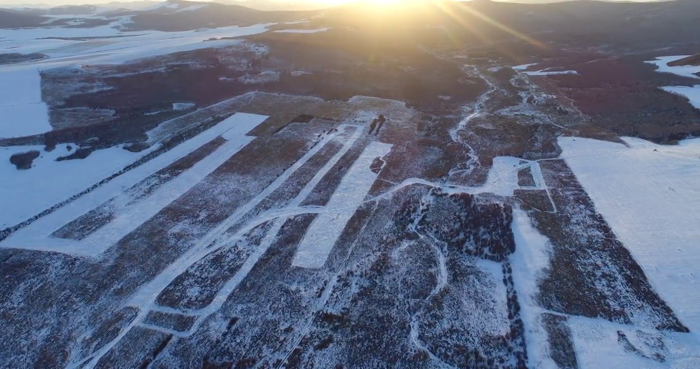 航拍内蒙古额尔古纳早春冰封雪原大地视频素材